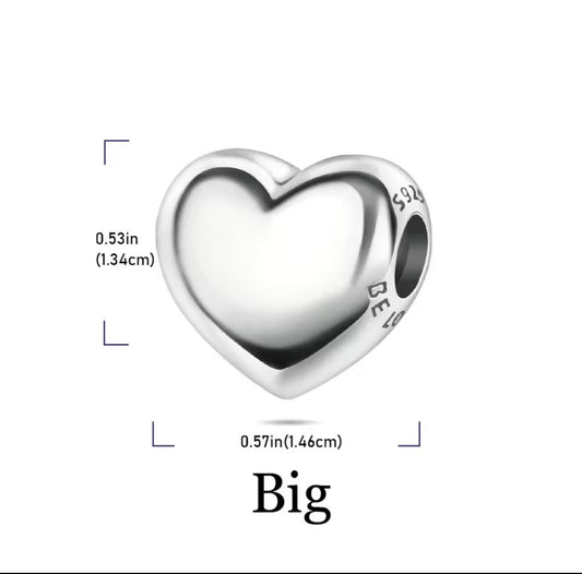Silver heart charm